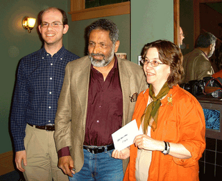 Author Lynda Williams presents first prize award to contestant Shedun Wasti for West End Writers contest June 2008